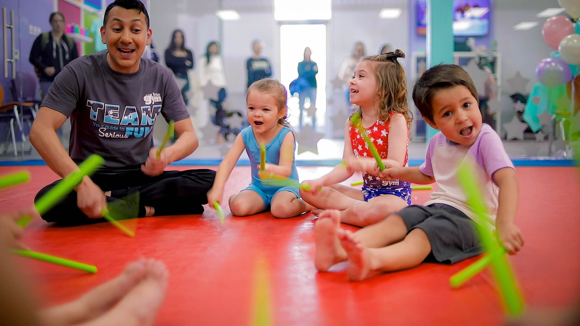 Children enjoying gymnastics in Funny Bugs class